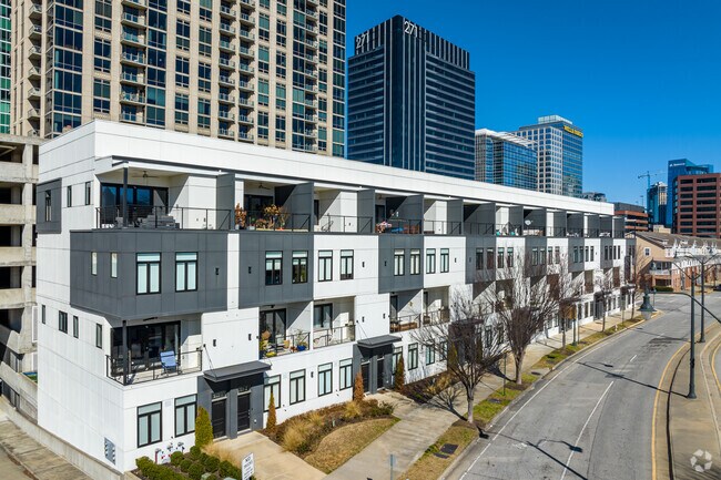 Modern townhomes in Home Park are located right next to retail and restaurants