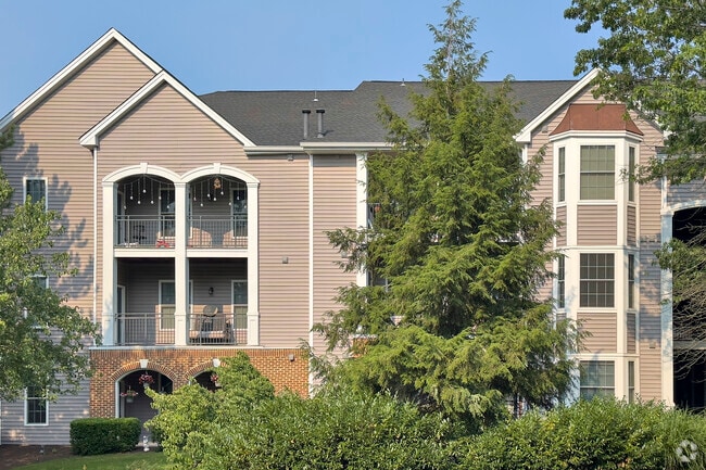 Modern condos with balconies allow owners to watch the sun set in Countryside.