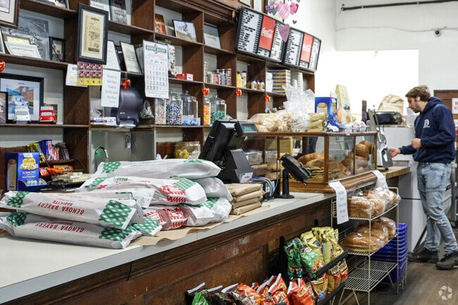 Explore the aisles of Genova Bakery for the finest deli meats and bread in August.