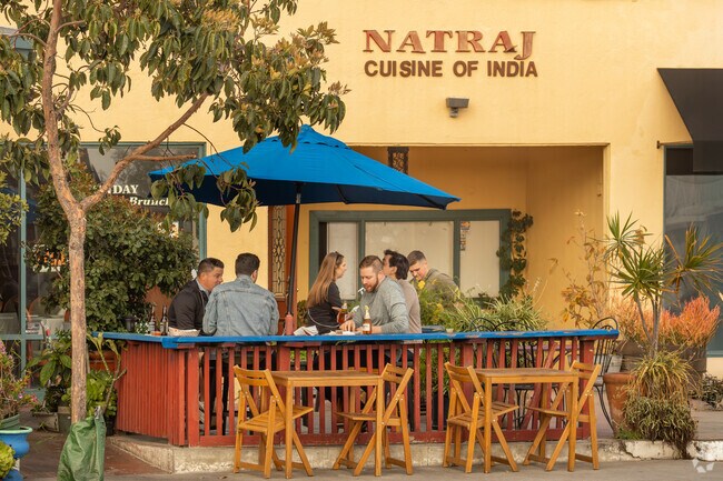 Natraj, Cuisine of India, located near The Village, offers a vibrant dining experience with authentic Indian flavors, where guests can savor rich curries, fragrant biryanis, and freshly baked naan in a cozy, welcoming atmosphere.