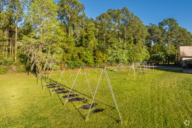 Students can enjoy the swings and jungle gym at Beacon of Hope Christian School.