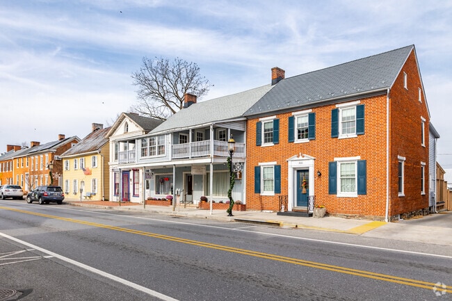 Stunning row of colonial revivals boasting a ton of Emmitsburg charm.