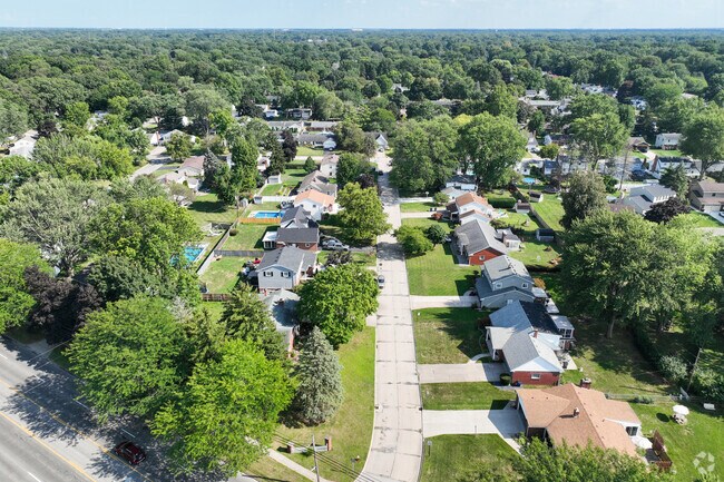 The neighborhood of Reynolds Corners has quiet residential streets with mature trees.