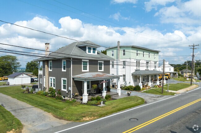 A rusted tin roof is a common sight in Rothsville.