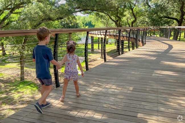 Stroll along a canopy walk under the oak trees at Bonnet Springs Park.