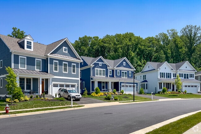 Majestic homes sitting on lush green lawns can be found throughout Merrifield.