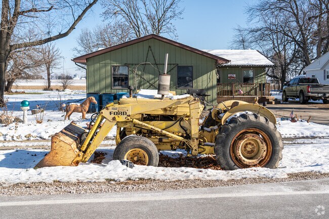 Tractors are common-place and can be seen parked in front of homes in Lisbon, IL.