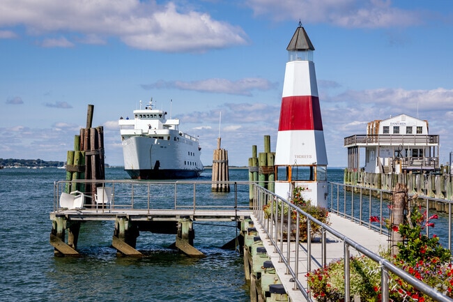 Residents and visitors catch the Ferry roll in at Mary Bayles Park in Port Jefferson.