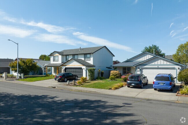 Consistent styles complement these homes on NE 51st St in North Image.