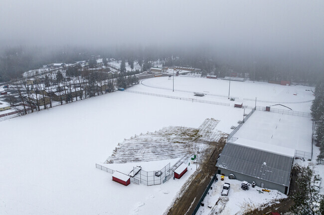 Newport High School has a football stadium behind the school.