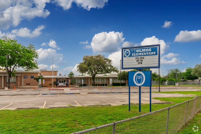 A sign relays important announcements to families at Olmos Elementary School in San Antonio.