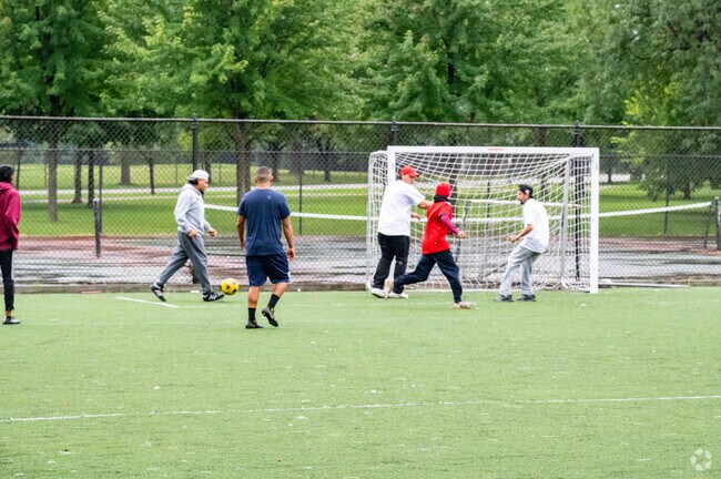 People play soccer at one of Marquette Park’s many fields, a popular spot for sports and recreation in Chicago Lawn.