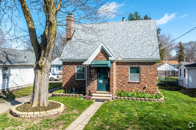 Small brick cottages give Fairground great character.
