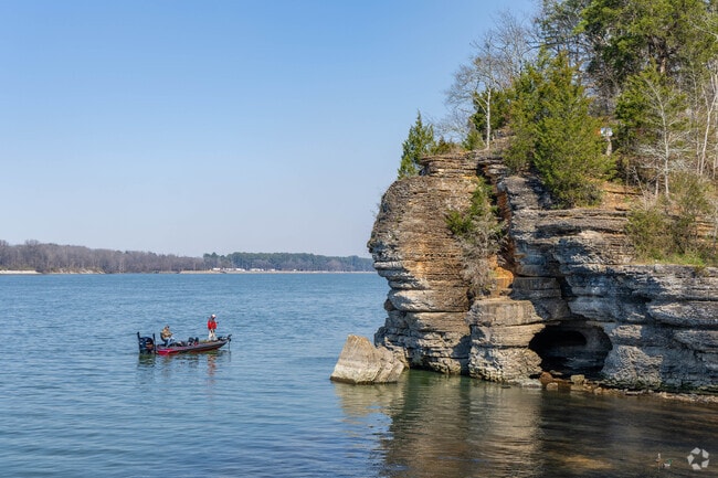Fisherman fish along the shores of Sheffield at Riverfront Park.