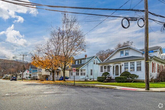 The streets of Wharton are adorned with a row of colonial homes that are beautifully painted.