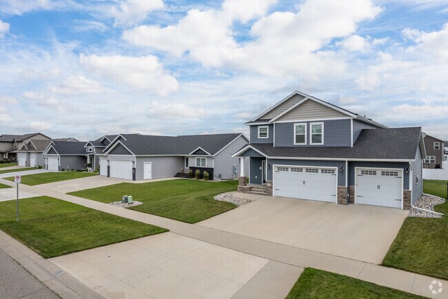 A row of homes in Brooks Harbor showcases diverse architectural styles for unique curb appeal.