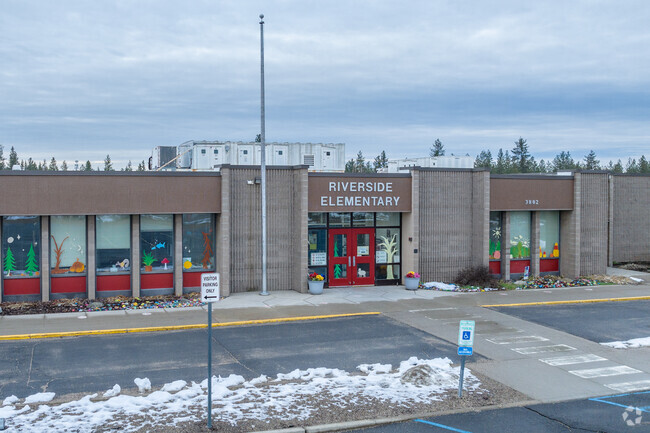 Riverside Elementary sits next to the local bus depot.