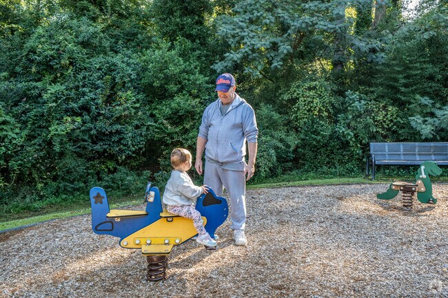 Henry Burns Park visitors play in the sun.