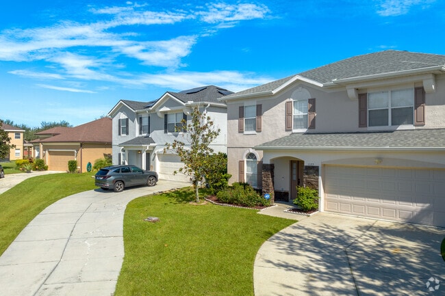 Lush green lawns add to the beauty of Falcon Trace.
