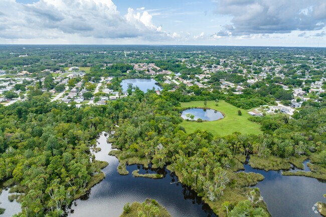 This lovely aerial view of Elfers shows it's diversity of homes and green space.