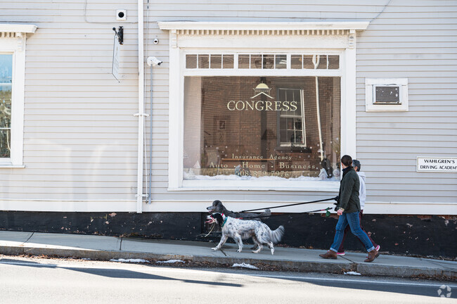 Grafton's Historical architecture attracts locals with pets for afternoon walks.