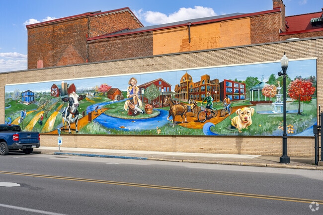 A mural near Market Street celebrates Meadville’s history and community icons.