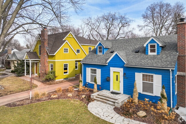 A Blue Cape Cod Style Home in the Minikahda Vista Neighborhood.