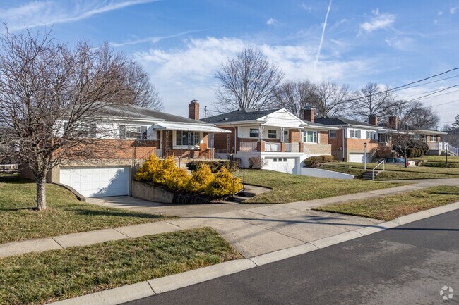 Modest homes with basement garages are popular in Kenwood.