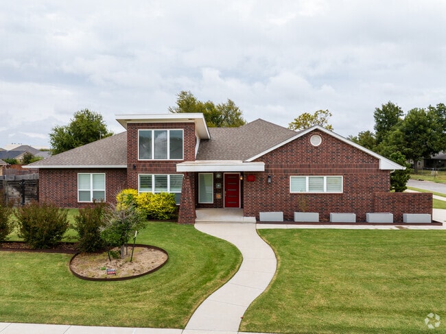 Sitting on large plots are large all brick homes in John F Kennedy.