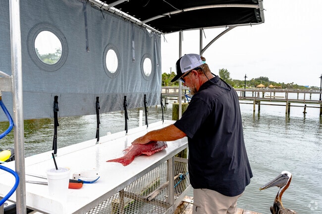 Catch your own dinner and filet at the marina before you head home in Sebastian Highlands.
