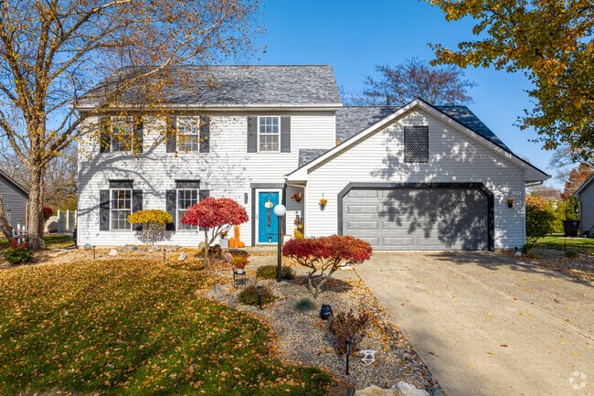 Most homes in Fort Wayne's Kensington Downs have professionally landscaped lawns.