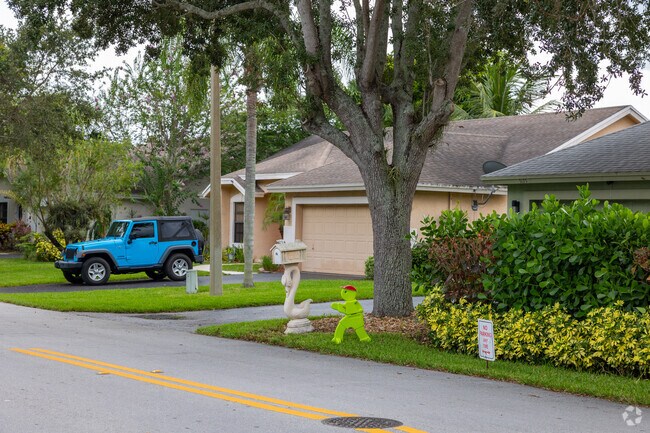 Relaxed streets will welcome you in Palm Beach Farms neighborhood.
