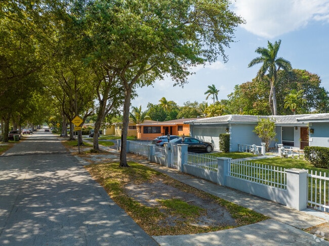 A row of cozy, ranch-style homes lines the street in Breezeswept Estates, giving the neighborhood a laid-back, welcoming vibe.”