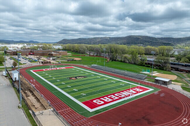 There is a football field and track on the Logan High School campus.
