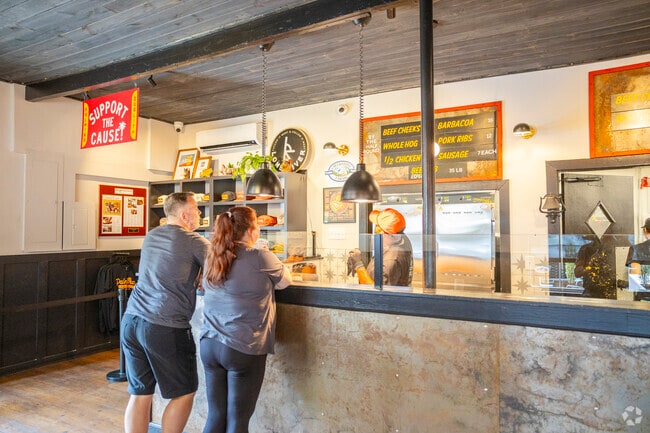 Palmira Barbecue on Ashley River Road serves up smoky ribs and brisket with rich Southern sides