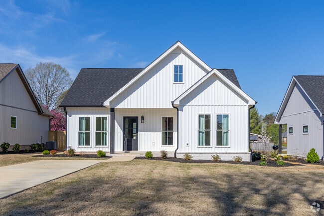 The modern farmhouse stands out from the other architectural styles in East Florence.
