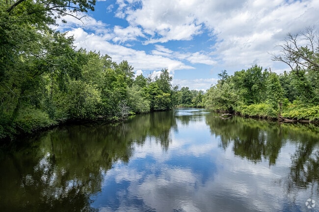 The Farmington River draws paddlers and fishermen to Tariffville.