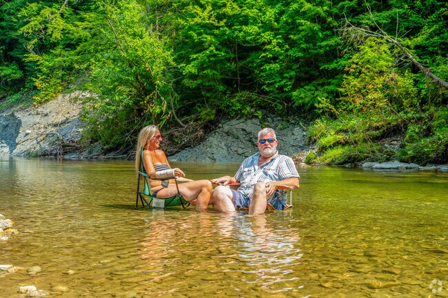 Cooling off in the Huntington River is a common summer scene in town.