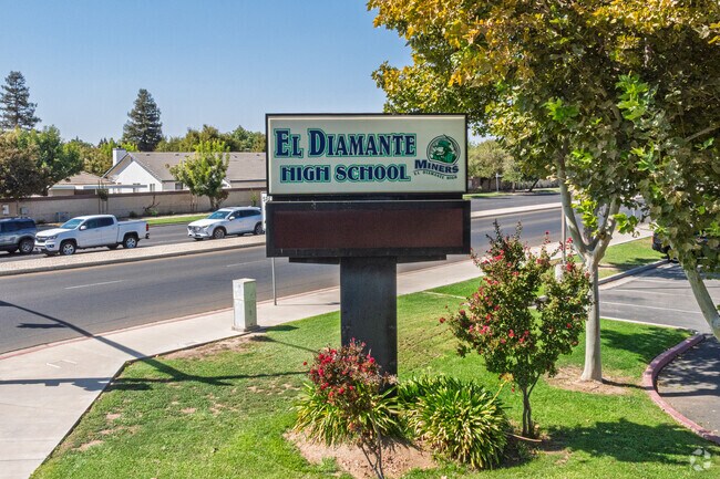 A lighted marquee outside El Diamante High School informs parents of events.
