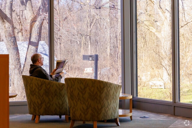 Dundee Library offers reading areas with full height windows for views outside.