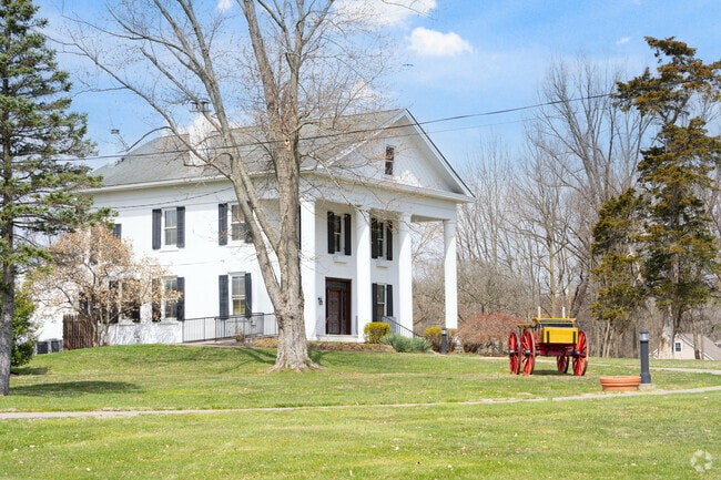 When you visit stop and look inside the historic Ross log house.