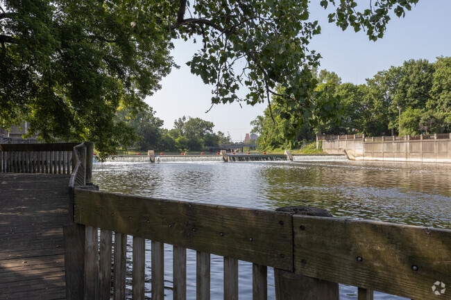 Scenic Lansing River Trail winds past Holmes Street Area toward Potter Park Zoo.