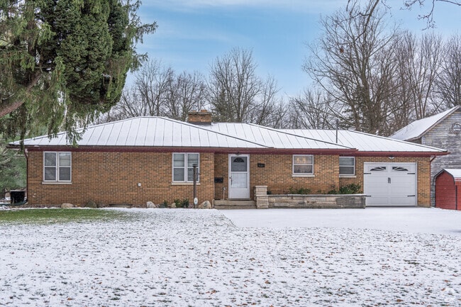 A brick ranch-style home can be found in Bellevue.