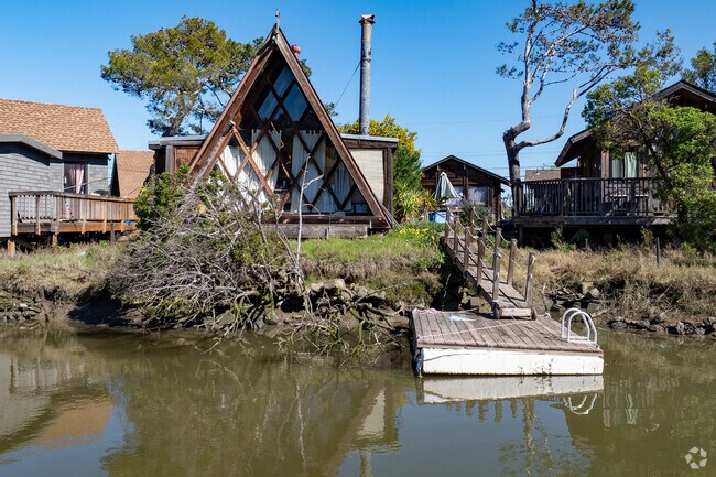 The Creekside neighborhood includes custom homes on the waterfront adding charm to the landscape.
