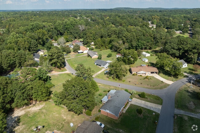 Ladonia homes are sitting amongst a plethora of trees and greenery.