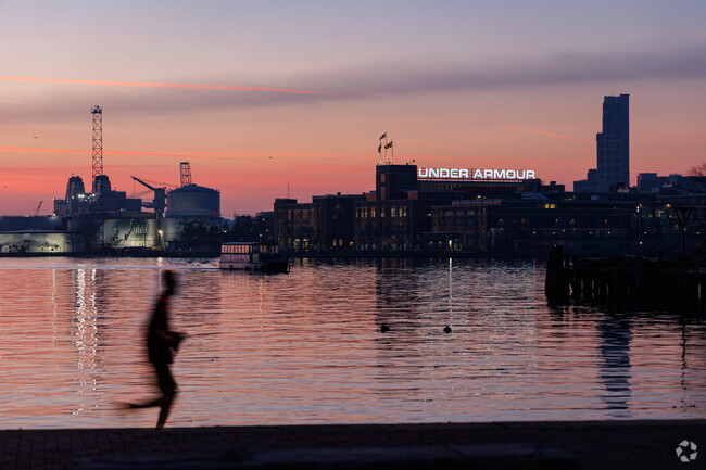 Residents of Fells Point exercise along the waterfront in Fells Point.