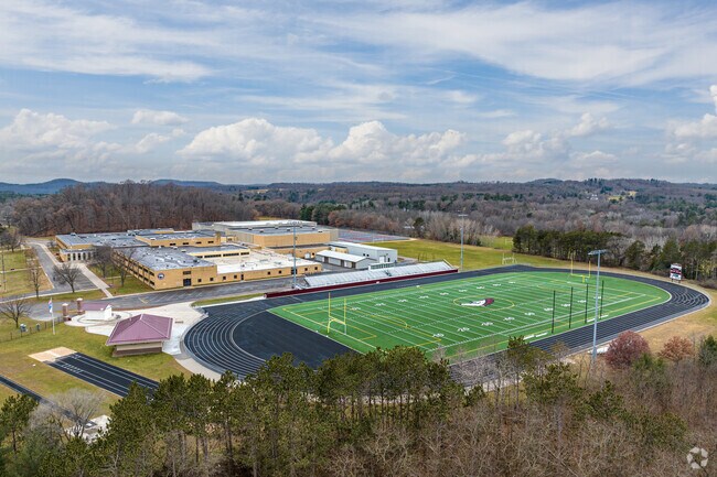 The athletics stadium is on the north side of Menomonie High School.