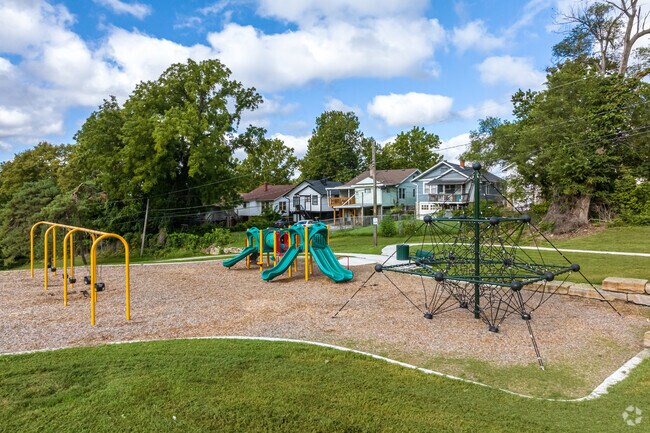 The kids will enjoy this playground at Oak Park while locals walk the trails or soak up the sun.