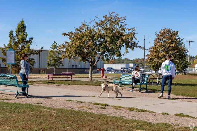 West End locals enjoy taking their pets to the Centennial Park Dog Park.