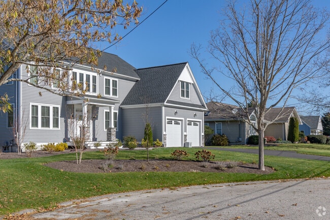 Large modern homes in the Northeast Bristol - Kickemuit neighborhood are well kept and tidy.